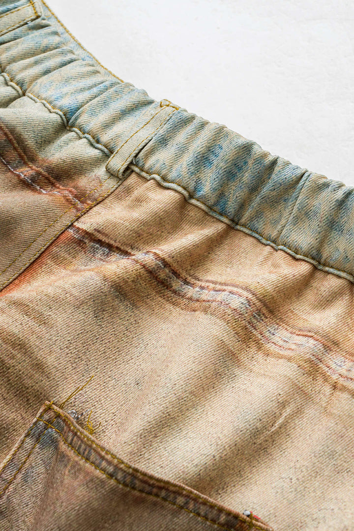 Kalhoty s kapsou a knoflíkem v abstraktním designu