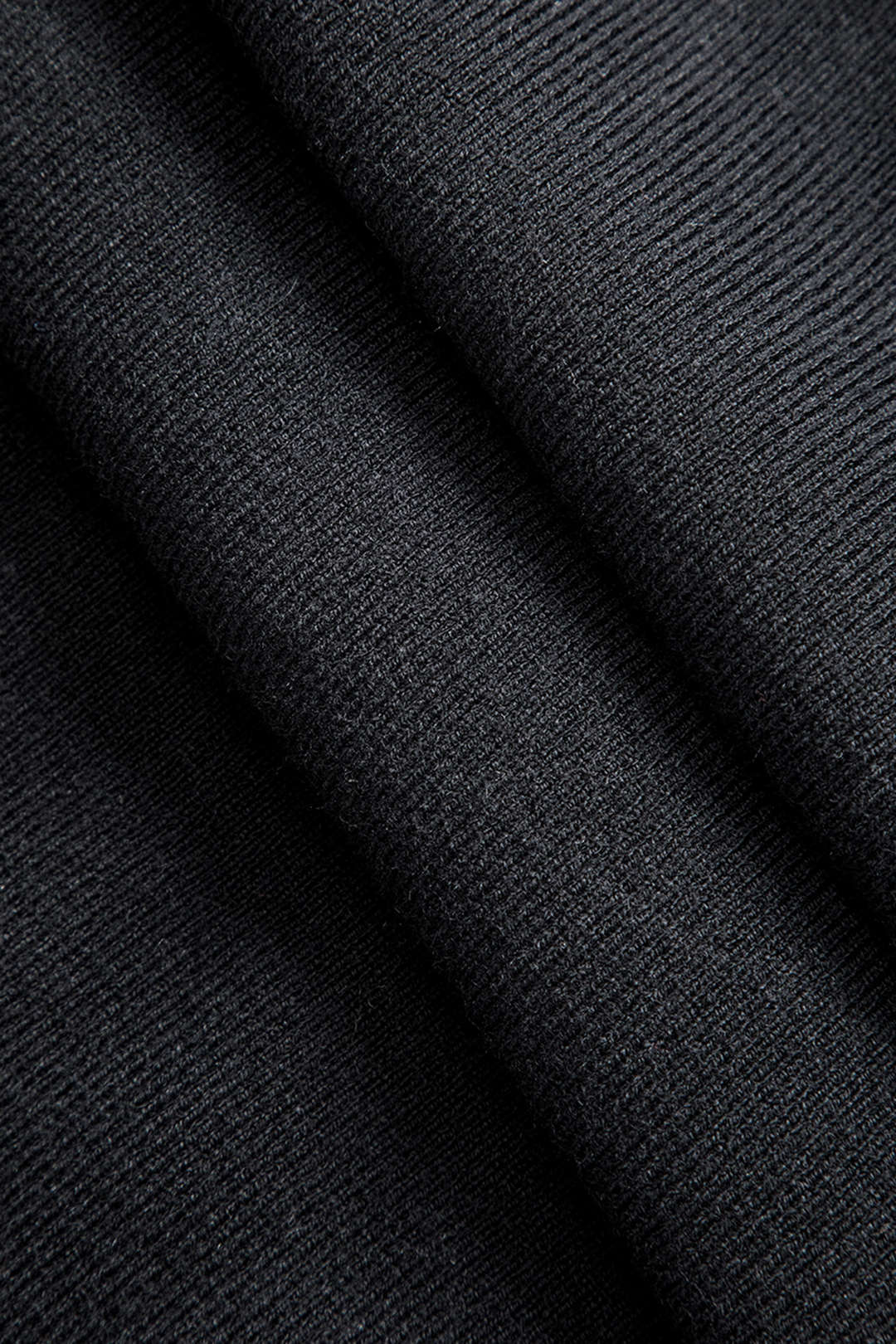 Asymetrická sukně s knoflíky z pevné látky