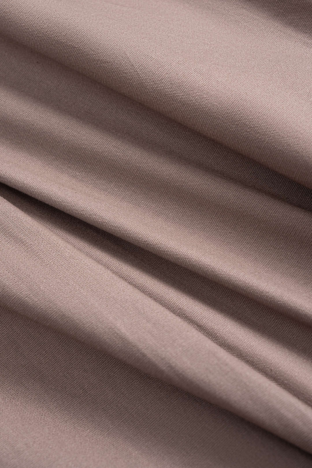 Asymetrické midi šaty s dlouhým rukávem a knoflíky