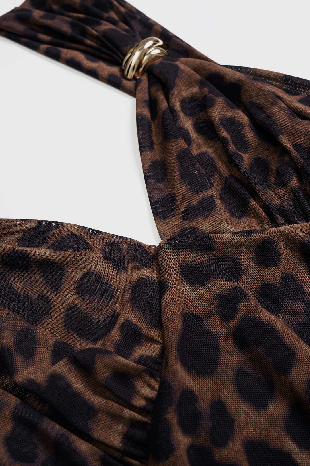 Kratší bezrukávové šaty z kovové síťoviny s leopardím vzorem