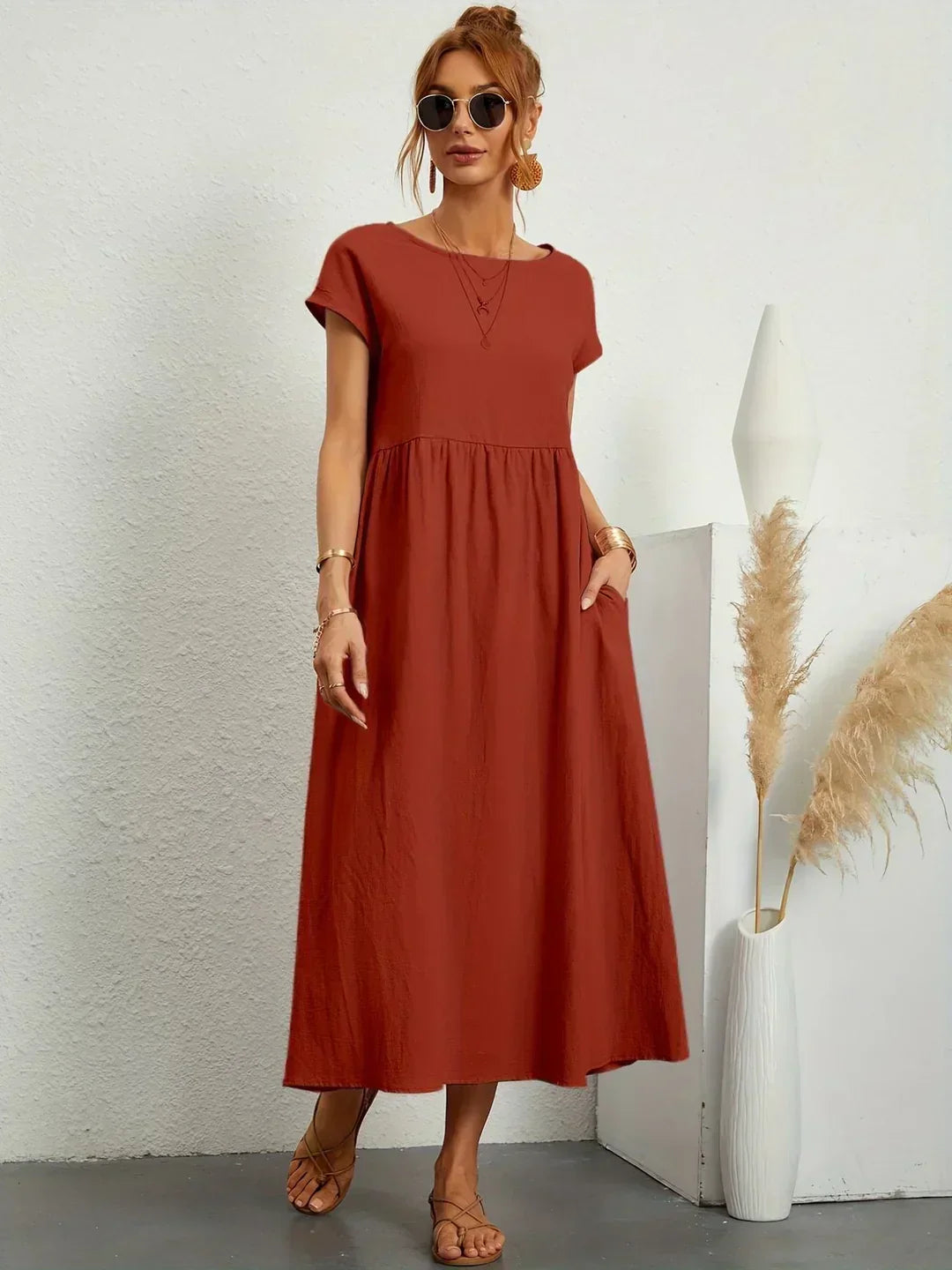 Adéla – Volné midi šaty s kapsami pro každodenní eleganci