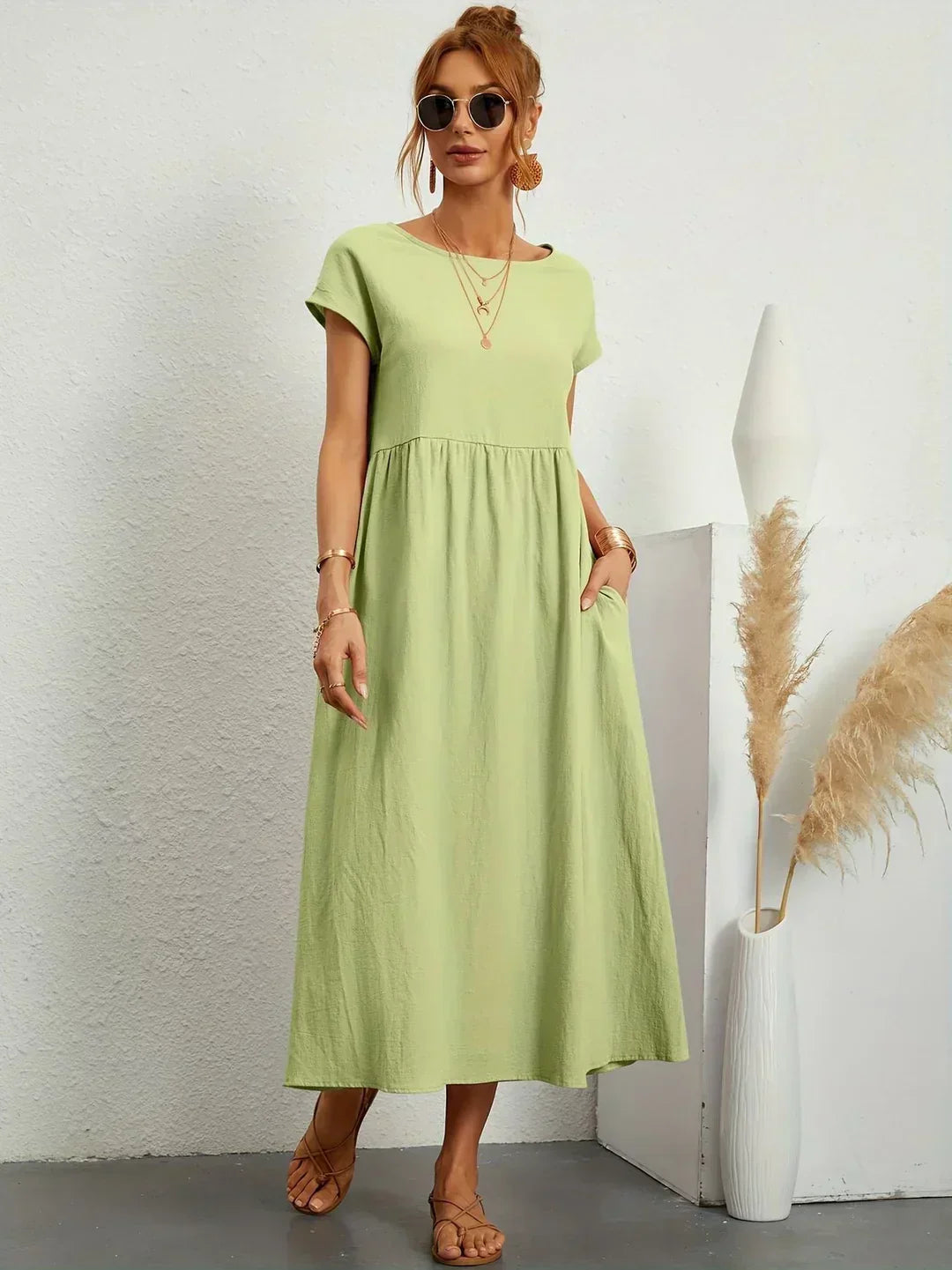 Adéla – Volné midi šaty s kapsami pro každodenní eleganci