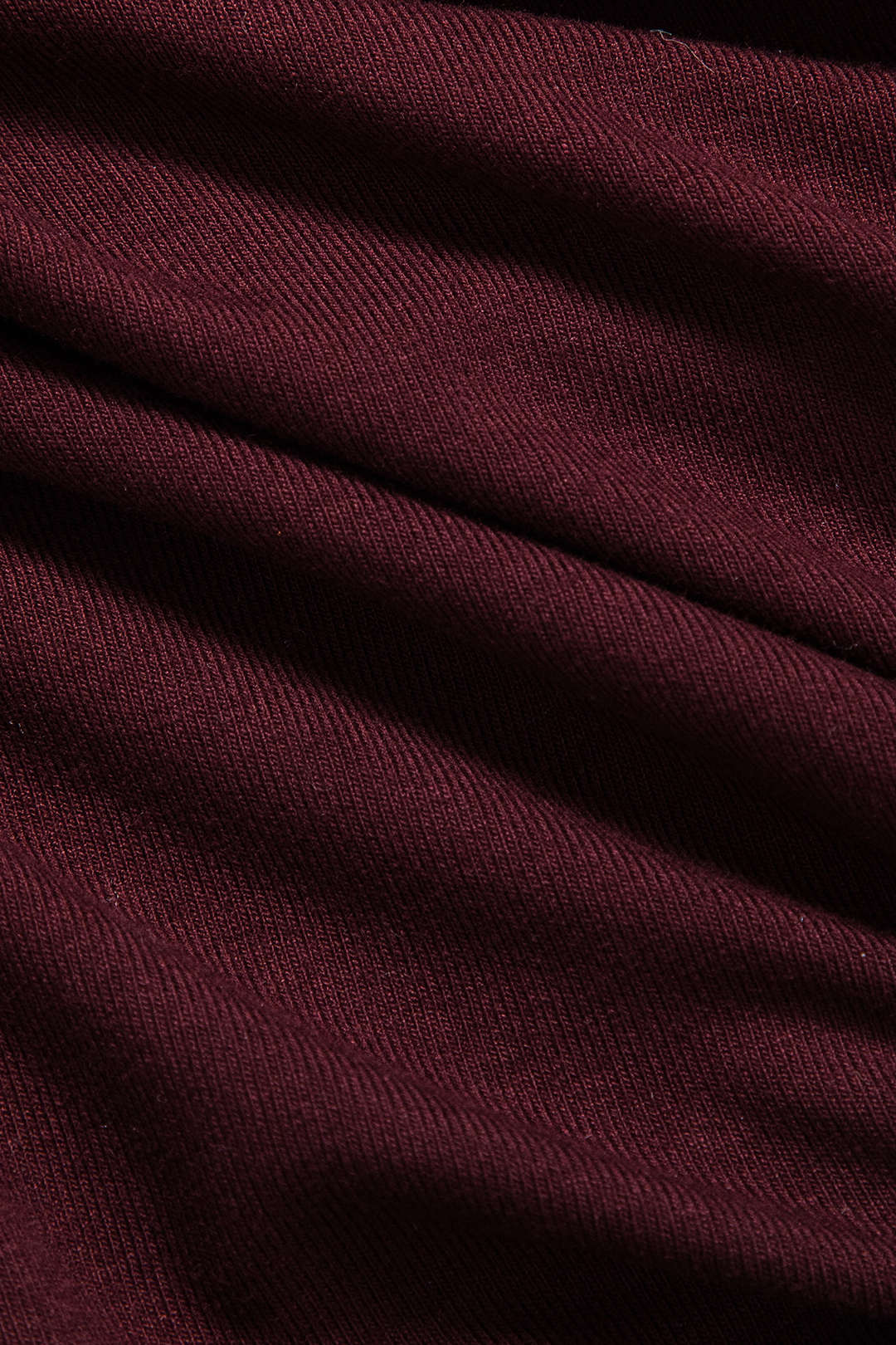 Tělo s dlouhým rukávem z umělé kůže s patchworkovým designem
