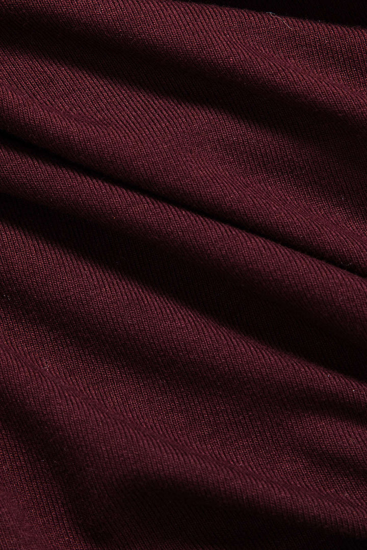 Tělo s dlouhým rukávem z umělé kůže s patchworkovým designem