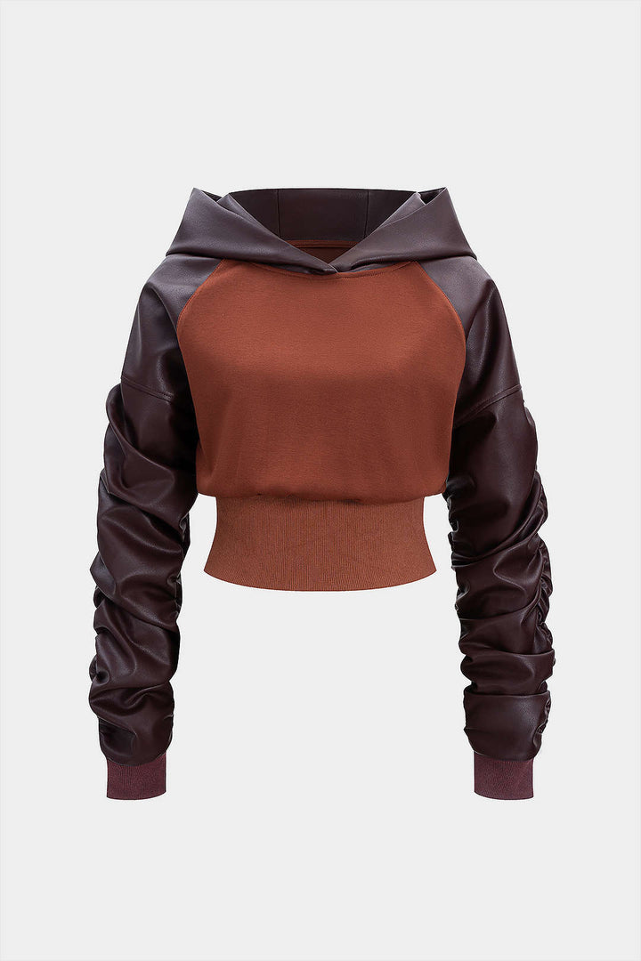 Mikina z umělé kůže s patchworkovým designem
